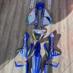 PERSONALIZAÇÃO COMPLETA SHERCO (KIT DE PLÁSTICOS + KIT DE AUTOCOLANTES) ULTRA RESISTENTE COM FUNDO PRIZM/PIXEL